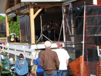 Mike Auldridge watching The Infamous Stringdusters at the Gettysburg Bluegrass Festival, 2010