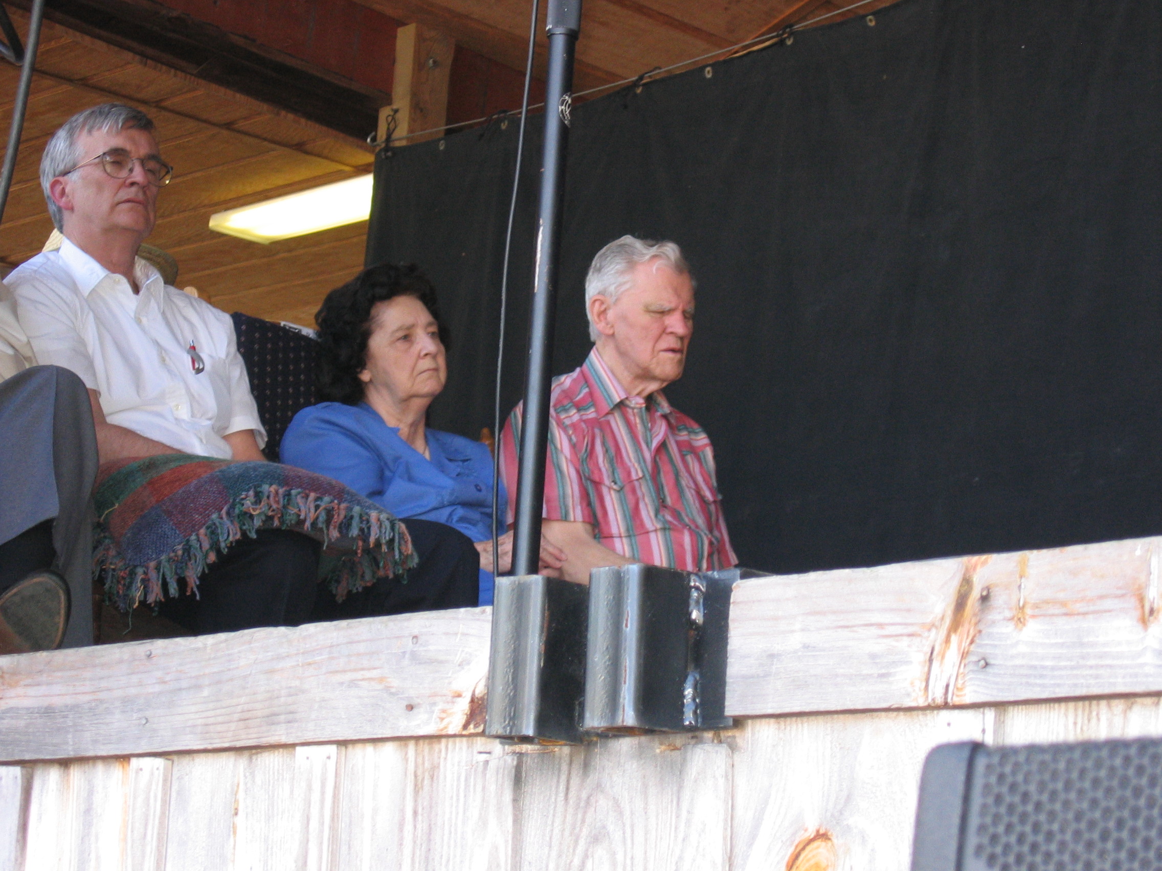 Rosa Lee and Doc Watson listening to Earl Scruggs at MerleFest, 2007